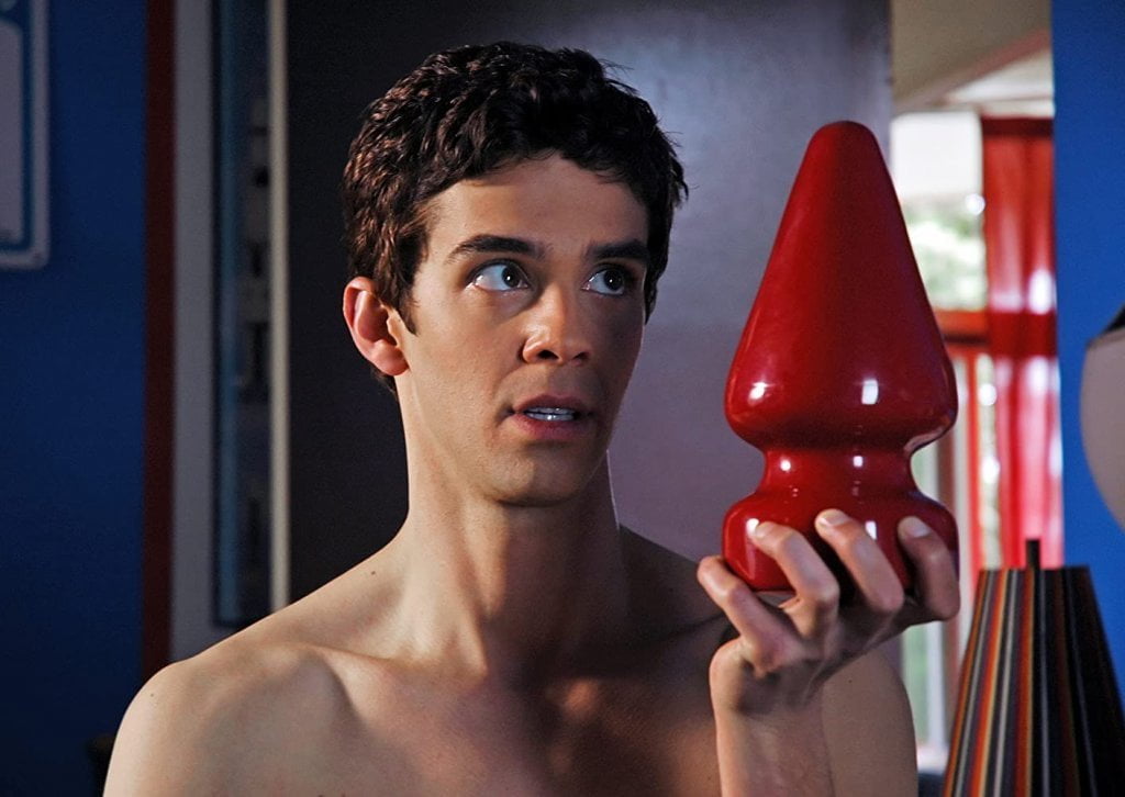 "Another Gay Movie" still - Andy holds up a huge, red, butt plug