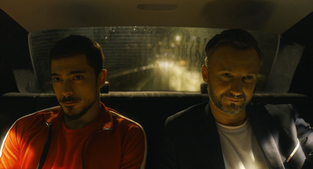 Still from "The Lawyer" - Ali & Marius ride in the back of a taxi cab together