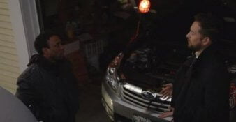 Still from "Red Lodge" - Jordan and Dave argue in front of the car outside, on the verge of breaking up