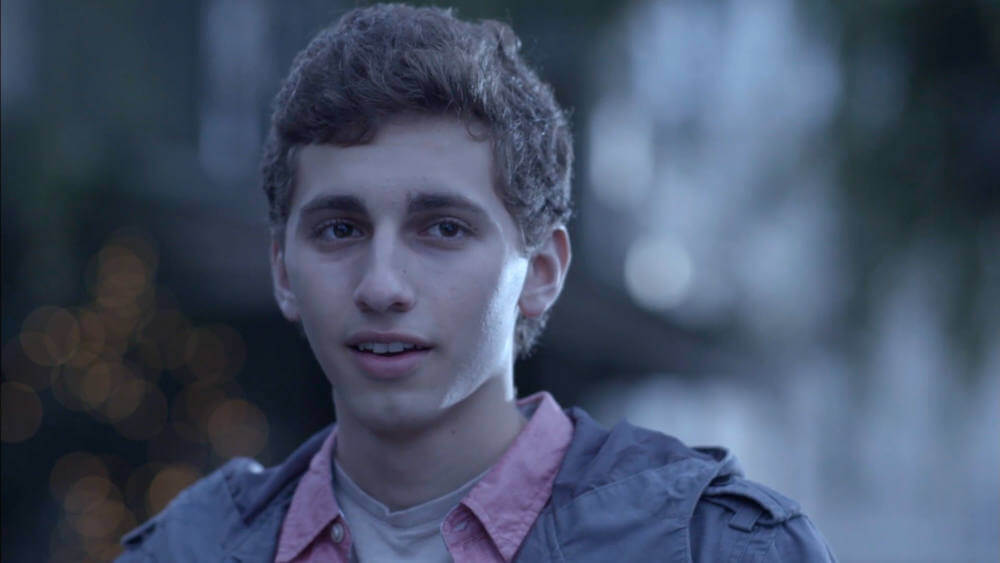 Still from “Tomorrow” - Clark watches Trevor drive away (offscreen) while standing in the driveway