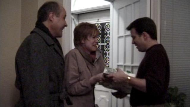 Still from Still from “Visions Of Sugarplums” - Joey welcomes his parents into his New York City apartment
